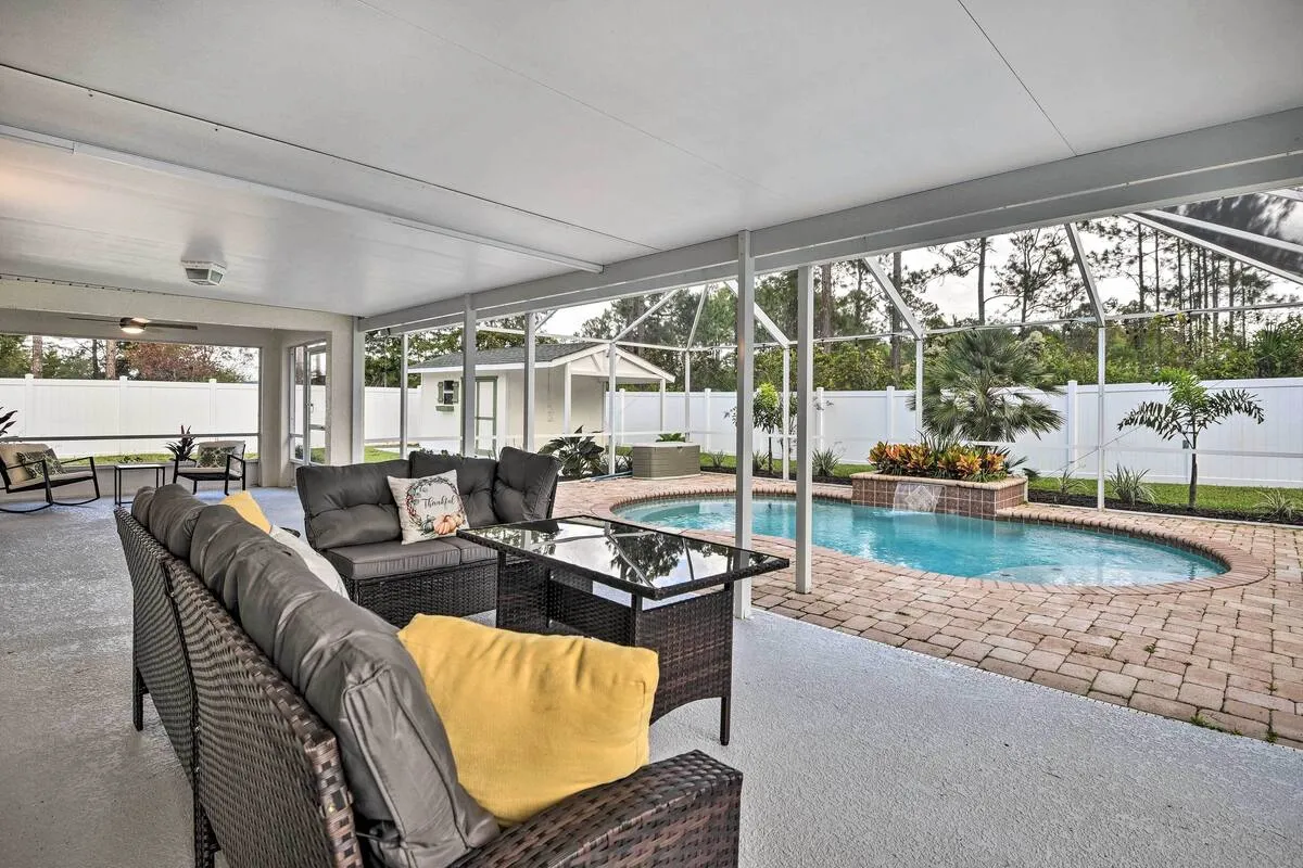 Palm Coast Retreat with Heated Pool & Private Patio