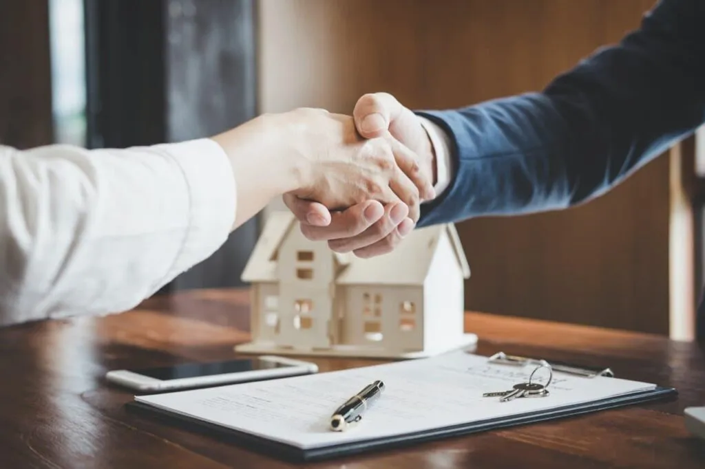 Local Real Estate Agents handshake
