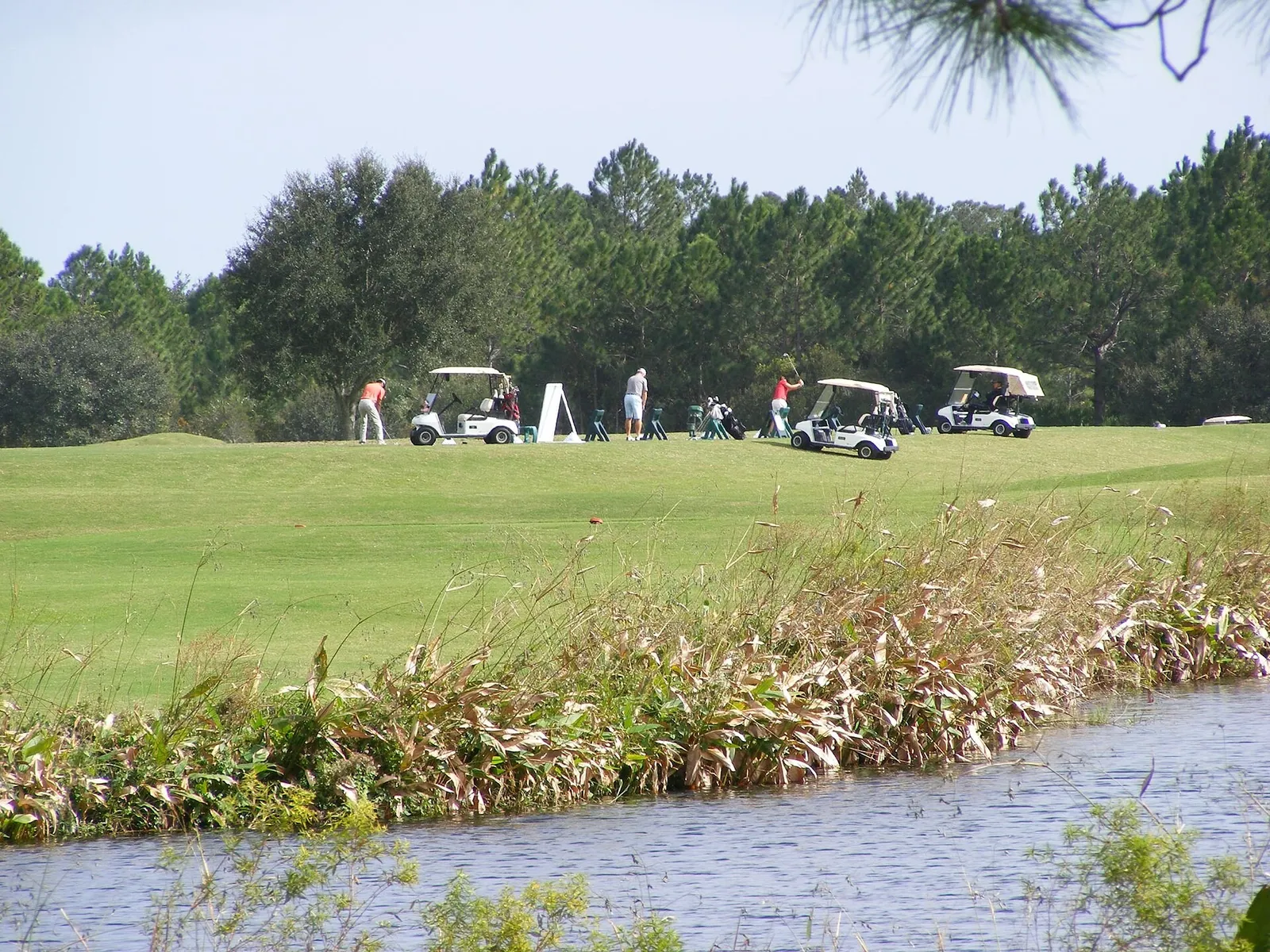 Golfers practice at LPGA International in Daytona Beach, Florida